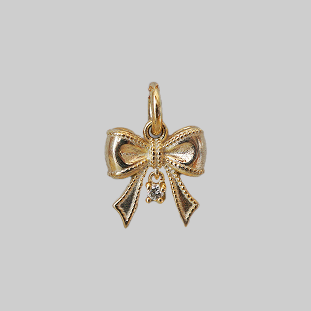 The Bow, solid gold ribbon charm
