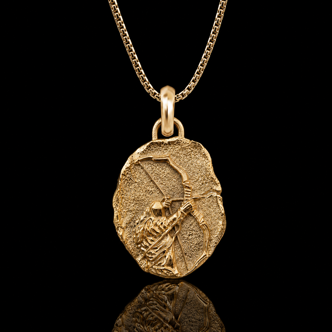 A gold pendant necklace featuring an irregularly shaped medallion pendant with an embossed figure holding a bow, suspended from a gold chain against a solid black background.