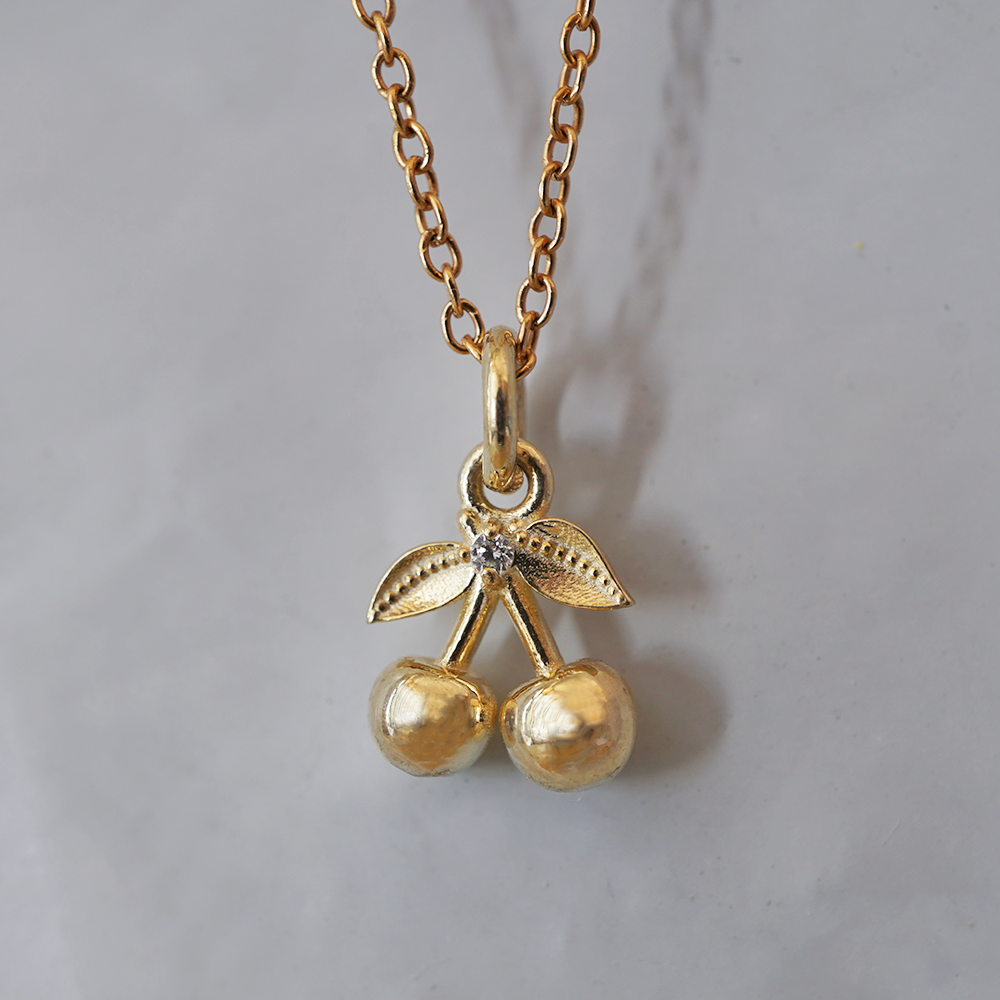 Cherry on Top solid gold double cherry charm with leaves and a natural diamond, alternate view