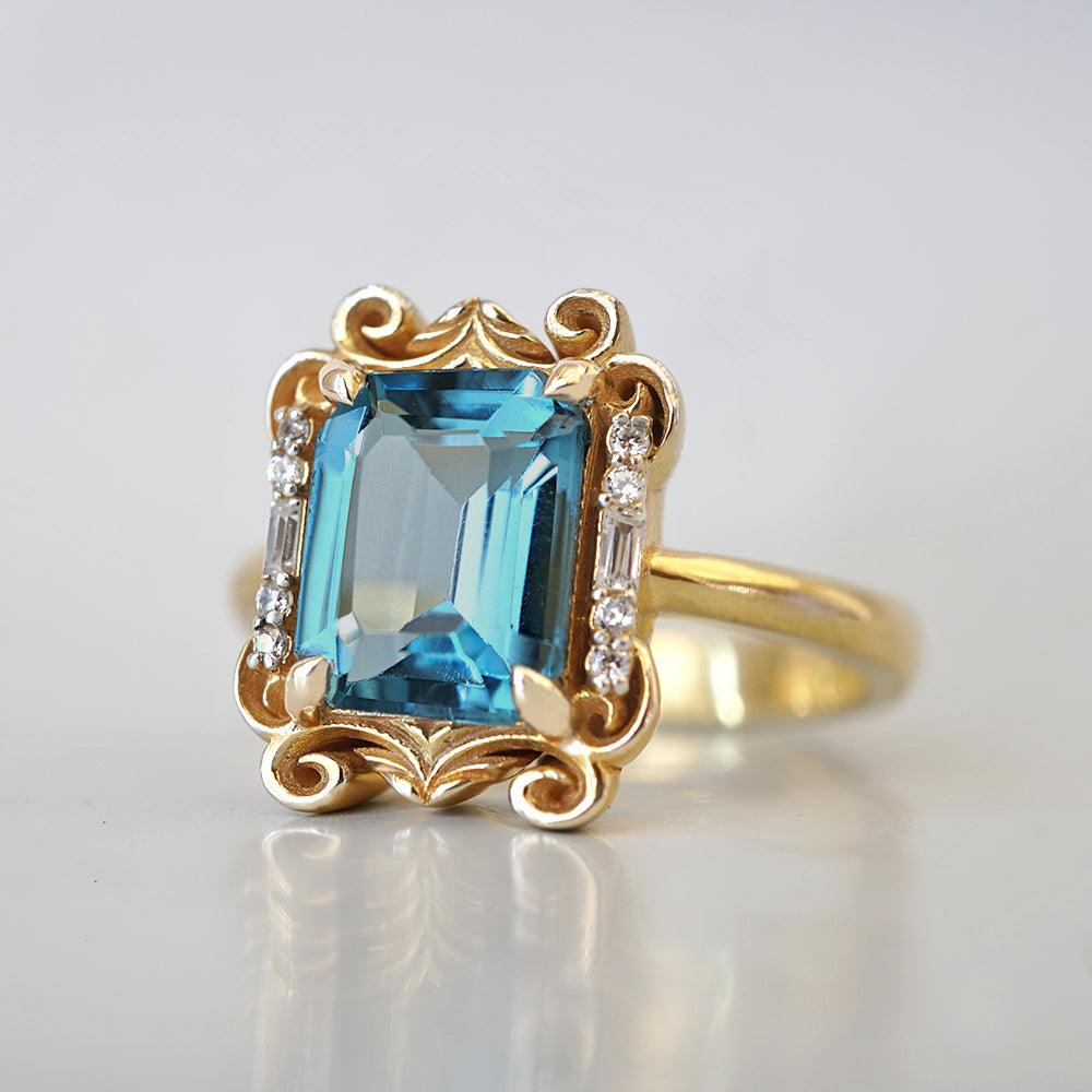 Isis London Blue Topaz Scroll Diamond Ring in 14K and 18K Gold