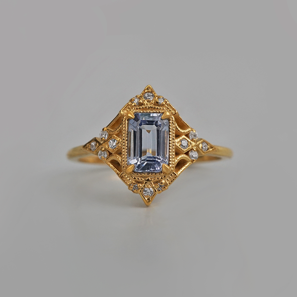 One Of A Kind: Blue Sapphire Marigold Diamond Ring in 14K and 18K Gold