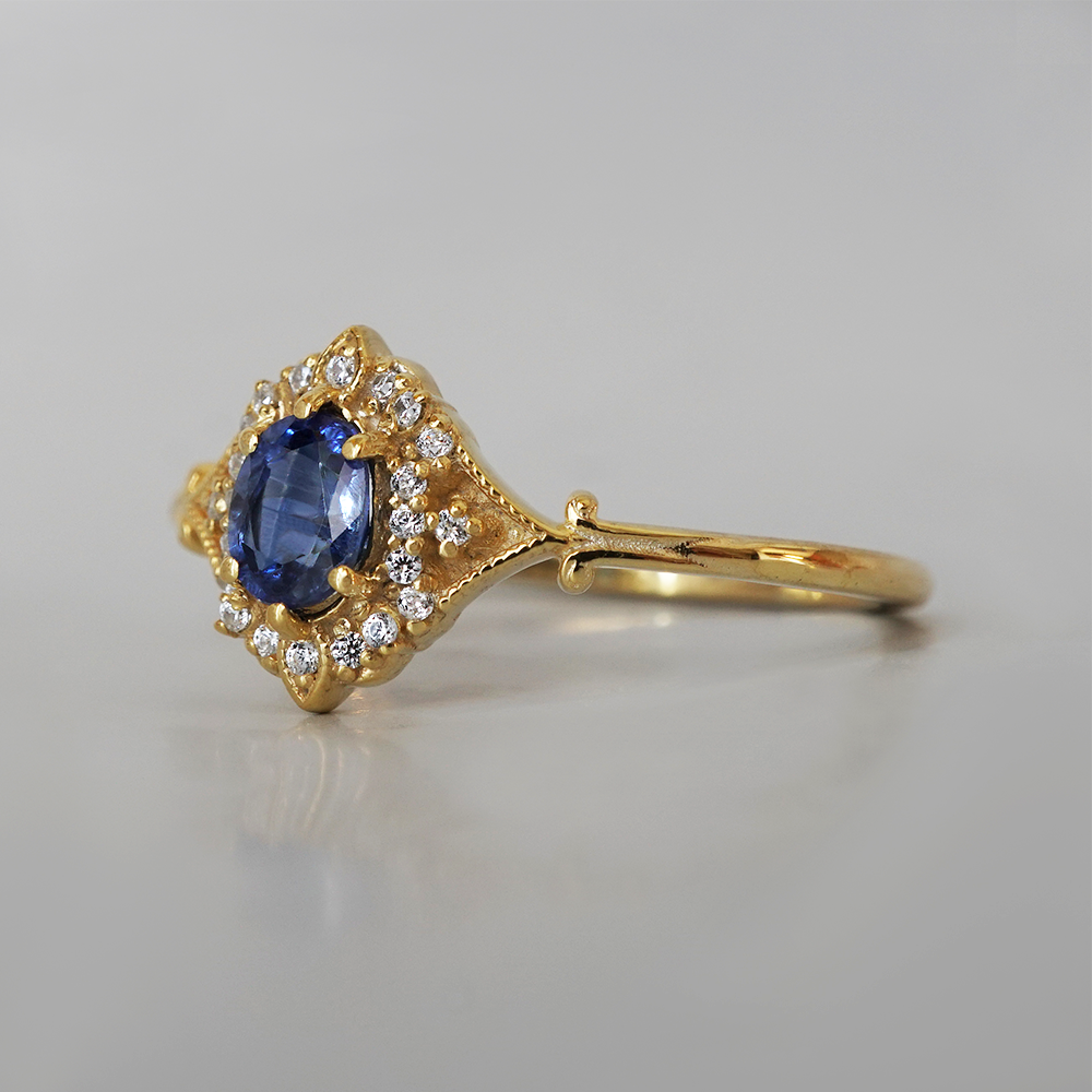 Blue Sapphire Silent Lyric Ring in 14K and 18K Gold