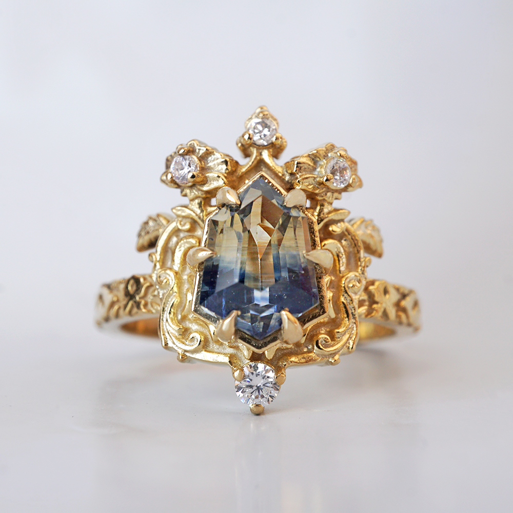 One Of A Kind: Bi Color Sapphire Shield Paradise Ring in 14K and 18K Gold