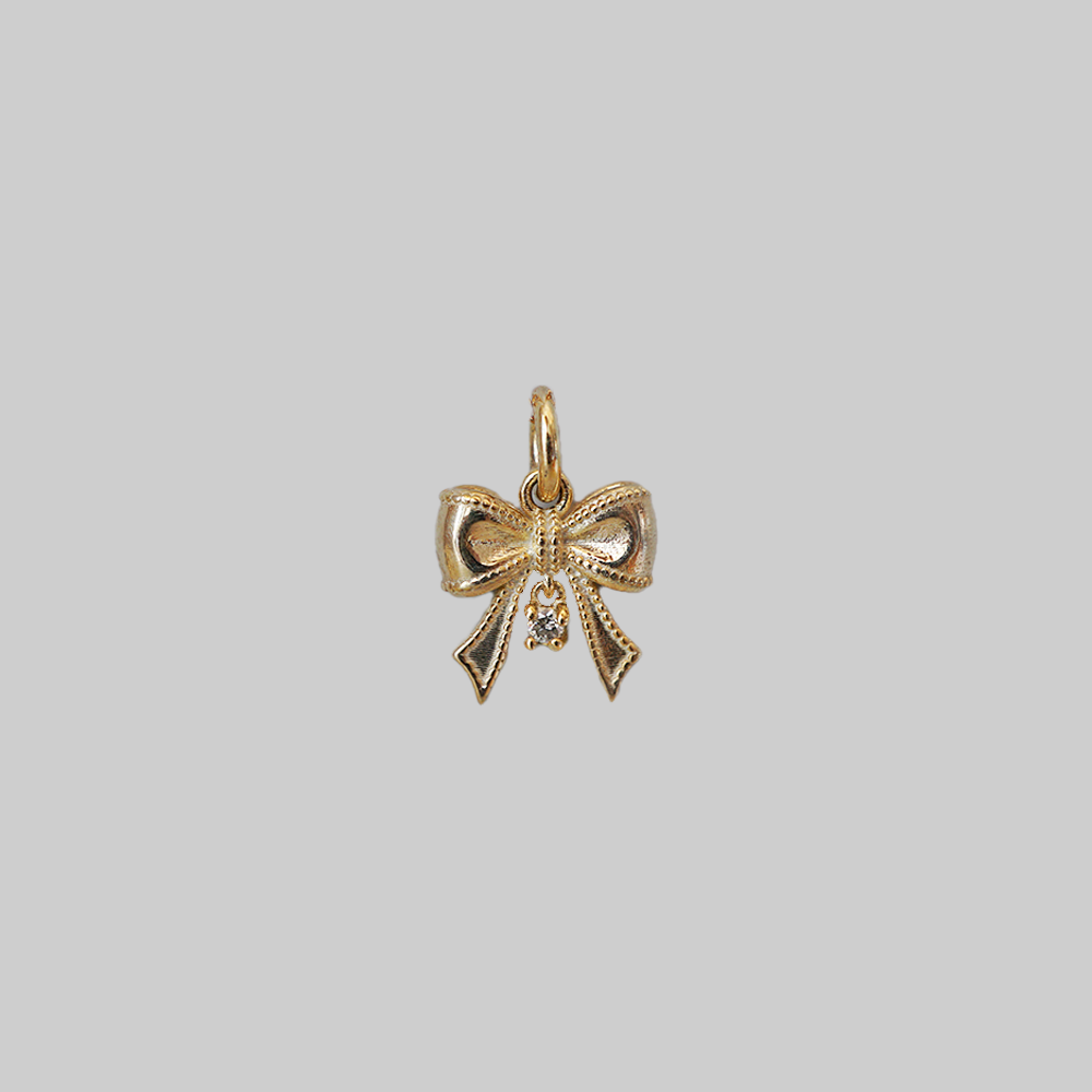 The Bow, solid gold ribbon charm