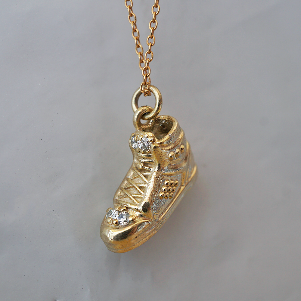 Sole Mate solid gold high-top sneaker charm with natural diamonds