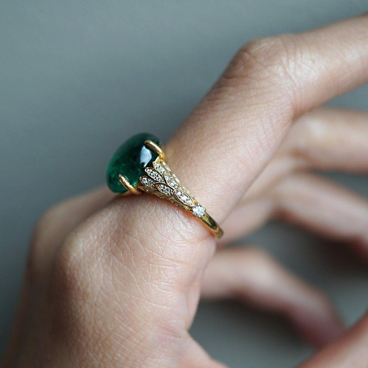 One Of A Kind: Oval Emerald Phoenix Diamond Ring