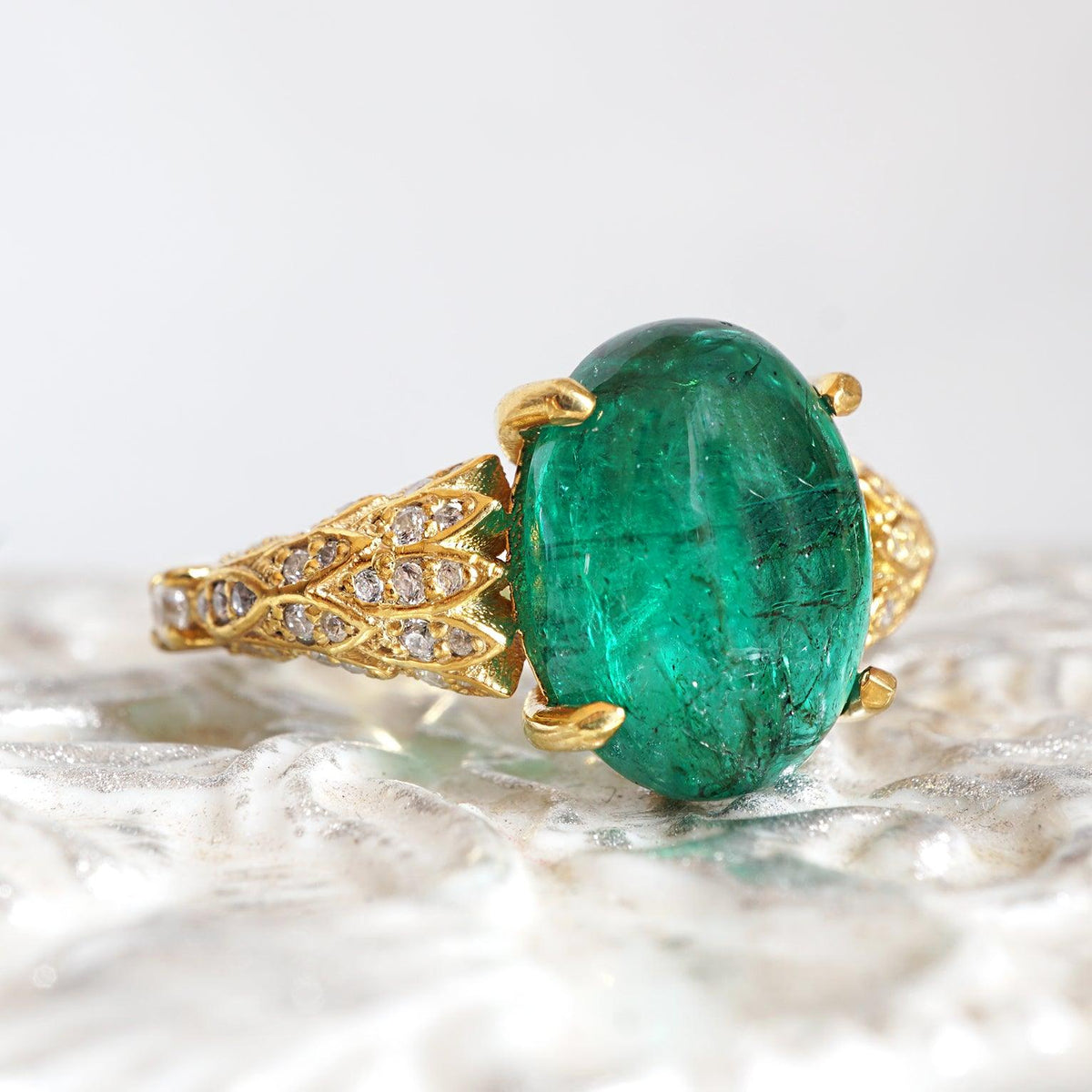 One Of A Kind: Oval Emerald Phoenix Diamond Ring
