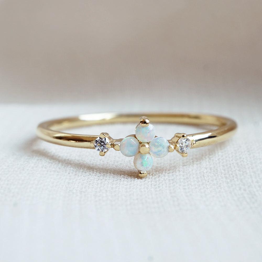 Forget me not opal diamond ring